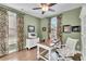 Comfortable home office featuring a desk, chair, and plenty of natural light at 812 Newsome Nw Aly, Marietta, GA 30064
