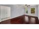 Bedroom featuring hardwood floors, a ceiling fan, and large windows for natural light at 821 Ralph Mcgill Ne Blvd # 2210, Atlanta, GA 30306