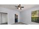 Bedroom with a ceiling fan, carpet, a window, and an ensuite bathroom at 821 Ralph Mcgill Ne Blvd # 2210, Atlanta, GA 30306