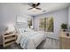 Stylishly furnished bedroom features carpeted floors, large windows, and calming decor at 821 Ralph Mcgill Ne Blvd # 2210, Atlanta, GA 30306