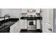 Well-equipped kitchen featuring stainless steel appliances and subway tiles at 821 Ralph Mcgill Ne Blvd # 2210, Atlanta, GA 30306
