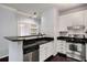 Cozy kitchen boasting stainless steel appliances, granite countertops and subway tile backsplash at 821 Ralph Mcgill Ne Blvd # 2210, Atlanta, GA 30306