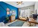 Charming bedroom with decorative accent wall, plush rug, and ample natural light at 187 Still Pine Bnd, Smyrna, GA 30082
