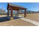 Community gazebo with picnic tables offering a relaxing gathering space with neighborhood views at 187 Still Pine Bnd, Smyrna, GA 30082