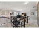 Bright and airy home office with desk, chair, and views overlooking the living area at 187 Still Pine Bnd, Smyrna, GA 30082