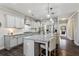 Spacious kitchen featuring a large center island, stainless steel appliances, and ample cabinetry at 187 Still Pine Bnd, Smyrna, GA 30082