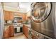 Galley kitchen with stainless steel appliances and stylish cabinetry at 2479 Peachtree Ne Rd # 1606, Atlanta, GA 30305