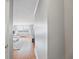 View of the living room through the doorway showing hardwood floors, carpet, sofa and a view of the city at 2479 Peachtree Ne Rd # 1606, Atlanta, GA 30305