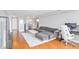 Open-concept living room features hardwood floors, gray walls, and a city view at 2479 Peachtree Ne Rd # 1606, Atlanta, GA 30305