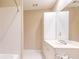 Bright bathroom featuring a single sink vanity and shower at 50 Biscayne Nw Dr # 6111, Atlanta, GA 30309