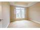 Well-lit bedroom with large windows, shutters, and neutral walls at 50 Biscayne Nw Dr # 6111, Atlanta, GA 30309