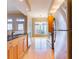 Modern kitchen with stainless steel appliances, light wood cabinets, and granite countertops at 50 Biscayne Nw Dr # 6111, Atlanta, GA 30309