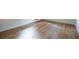 Clean bedroom design, features laminate wood flooring and base trim at 5384 Blackhawk Dr, Acworth, GA 30102