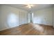 Simple yet functional bedroom with a large closet, wood floors and lots of natural light at 5384 Blackhawk Dr, Acworth, GA 30102