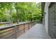 This home has a spacious deck with wood railing, providing an outdoor living space at 5384 Blackhawk Dr, Acworth, GA 30102