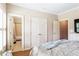 Bedroom with multiple doorways, closet, and ensuite bath at 2130 Monhegan Se Way # 11, Smyrna, GA 30080