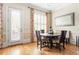 Breakfast nook features a dark wood table with seating for four and access to the patio at 2130 Monhegan Se Way # 11, Smyrna, GA 30080