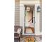 Inviting entryway features a charming welcome mat, stylish decor, and a glimpse of the staircase at 2130 Monhegan Se Way # 11, Smyrna, GA 30080