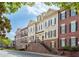 Attractive townhome exteriors featuring a blend of brick and siding, showcasing curb appeal at 2130 Monhegan Se Way # 11, Smyrna, GA 30080