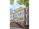 Elegant townhome exteriors with a mix of siding and brick, offering a sophisticated look at 2130 Monhegan Se Way # 11, Smyrna, GA 30080