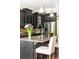Stylish kitchen with dark cabinets, granite countertops, and stainless steel appliances, a culinary delight at 2130 Monhegan Se Way # 11, Smyrna, GA 30080