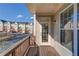 A balcony view shows the neighborhood with sidewalks, street and charming townhomes at 2382 Gallard St, Lawrenceville, GA 30043