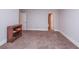 Bedroom offers neutral paint, plush carpet and a door to the en suite bathroom at 2382 Gallard St, Lawrenceville, GA 30043