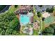Aerial view of the community pool, water park, playground, and clubhouse at 3006 Cambridge Hill Dr, Dacula, GA 30019