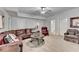 Finished basement featuring a large sectional sofa, neutral carpet, and recessed lighting at 3006 Cambridge Hill Dr, Dacula, GA 30019