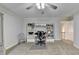 Large bedroom with a ceiling fan and a full wall of built-in shelving and storage at 3006 Cambridge Hill Dr, Dacula, GA 30019