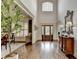 Grand foyer with hardwood floors, high ceilings, and ornate front door and staircase at 3006 Cambridge Hill Dr, Dacula, GA 30019