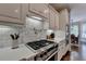 Bright kitchen with stainless appliances, granite counters, and an open layout at 3006 Cambridge Hill Dr, Dacula, GA 30019