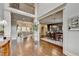 Spacious living room featuring hardwood floors, coffered ceiling, and open floor plan at 3006 Cambridge Hill Dr, Dacula, GA 30019