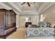Relaxing main bedroom with a ceiling fan, chest of drawers, and serene atmosphere with large wardrobe at 3006 Cambridge Hill Dr, Dacula, GA 30019