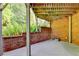 The covered brick patio provides shade and outdoor living space at 3006 Cambridge Hill Dr, Dacula, GA 30019