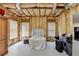 Unfinished storage room with exposed insulation and windows at 3006 Cambridge Hill Dr, Dacula, GA 30019