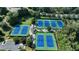 Overhead aerial view of the community tennis courts and parking at 3006 Cambridge Hill Dr, Dacula, GA 30019