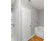 Bright bathroom with a walk-in shower, white door, and clean, neutral decor at 735 Crestwell Sw Cir, Atlanta, GA 30331