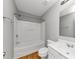 Clean bathroom with a shower-tub combo and a modern vanity with ample counter space at 735 Crestwell Sw Cir, Atlanta, GA 30331