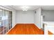 Light-filled dining area with hardwood floors and sliding glass doors to outside at 735 Crestwell Sw Cir, Atlanta, GA 30331