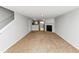 Spacious living room with fireplace and view into kitchen area at 735 Crestwell Sw Cir, Atlanta, GA 30331