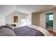 Cozy bedroom with a comfortable bed, soft natural light, and en suite bathroom at 20 Screven Ne St, Atlanta, GA 30307