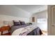 Comfortable bedroom featuring a plush bed, window, and warm, inviting decor at 20 Screven Ne St, Atlanta, GA 30307