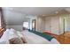 Spacious bedroom with hardwood floors, a window seat, and ample storage at 20 Screven Ne St, Atlanta, GA 30307