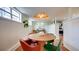Cozy dining room features stylish decor, natural light, and a seamless transition to the kitchen at 20 Screven Ne St, Atlanta, GA 30307