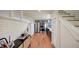 Open layout to a kitchen with stainless appliances and an adjacent staircase at 20 Screven Ne St, Atlanta, GA 30307
