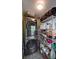 Functional laundry room with stainless steel shelving, washer, and dryer at 20 Screven Ne St, Atlanta, GA 30307