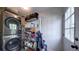Well-equipped laundry room with storage shelves and direct access to the exterior at 20 Screven Ne St, Atlanta, GA 30307