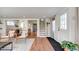 Bright, open-concept living room leads into the kitchen, providing a seamless flow and airy atmosphere at 20 Screven Ne St, Atlanta, GA 30307