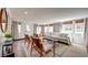 Bright living room showcasing neutral tones, a comfortable seating arrangement, and large windows for ample natural light at 20 Screven Ne St, Atlanta, GA 30307